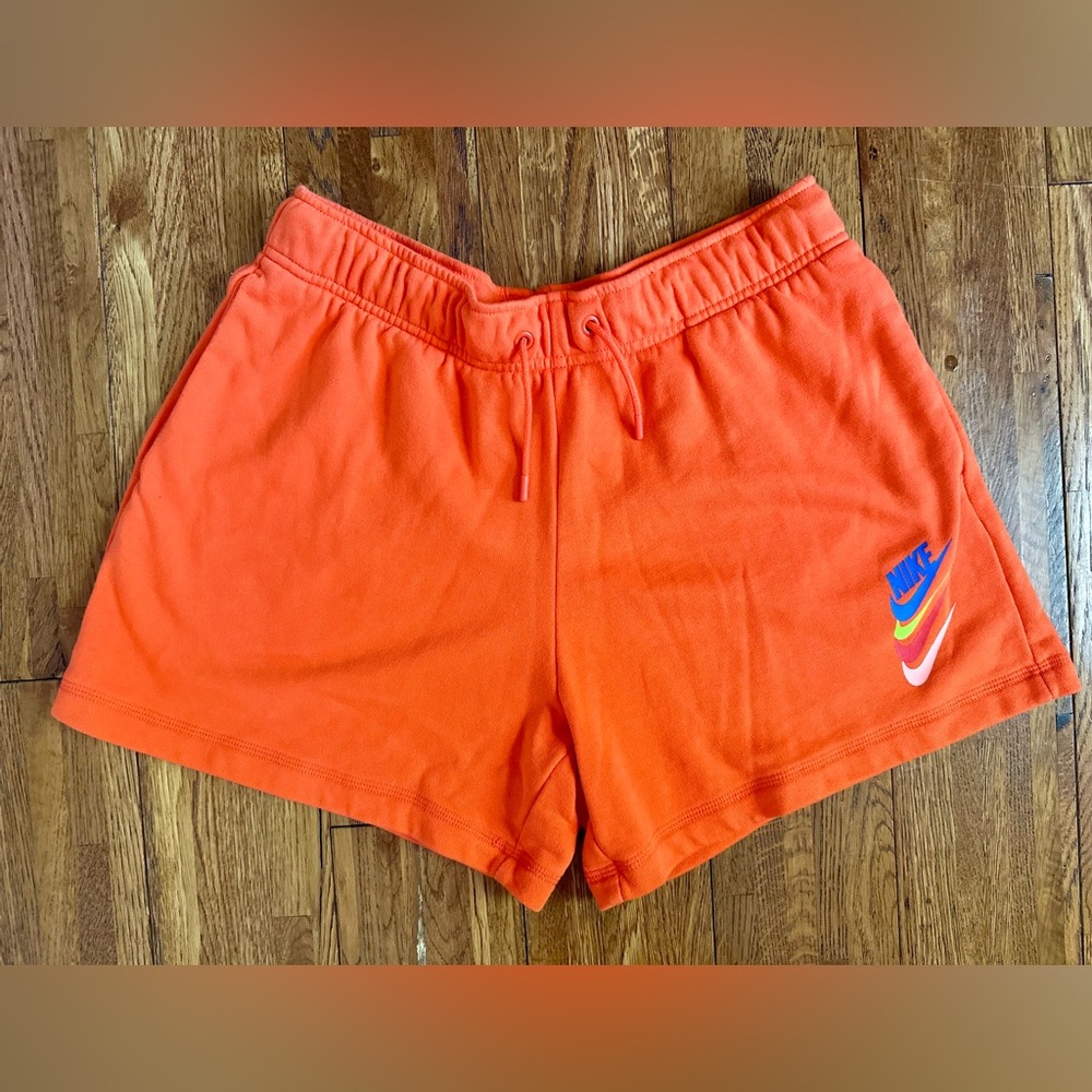 Nike DNA Shorts Women’s Size Medium. Bright orange. Multicolor Nike Logo. NWOT